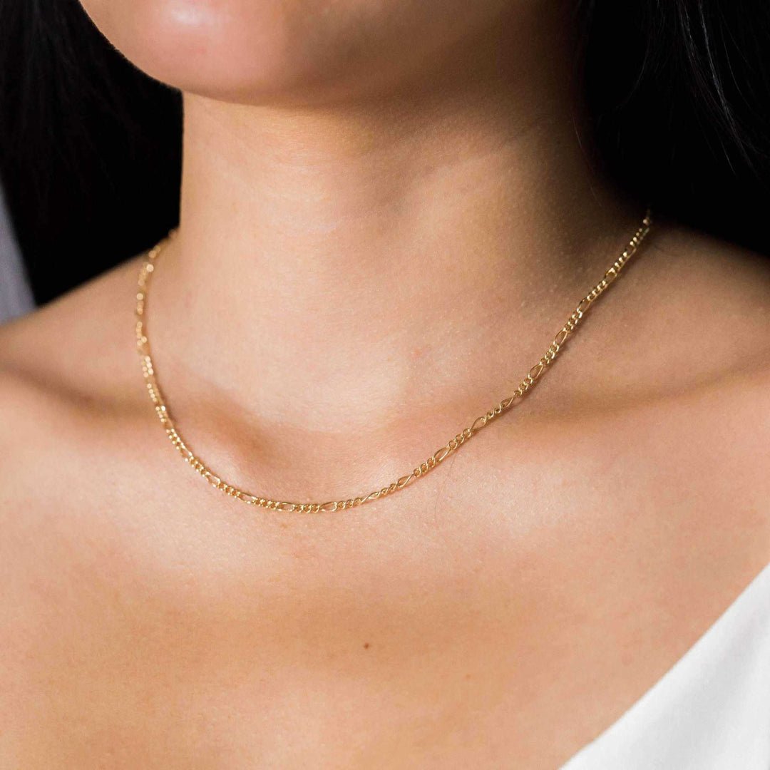 Figaro chain necklace on a women